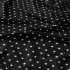 Tissu coton au mètre, 125 g/m², largeur 160 cm, imprimé Etoiles blanche et noir